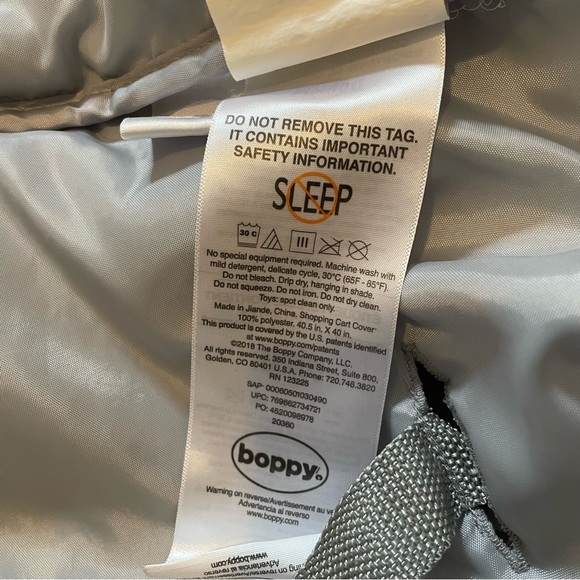 Boppy Shopping Cart & High Chair Cover with attached book toy - Picture 2 of 3